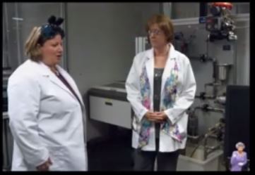 Two people in lab coats